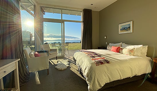 Prospect Lodge luxury guest room with lake view of Lake Te Anau