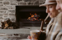 Enjoy a summer evening outside by the fire at Prospect Lodge accommodation Te Anau
